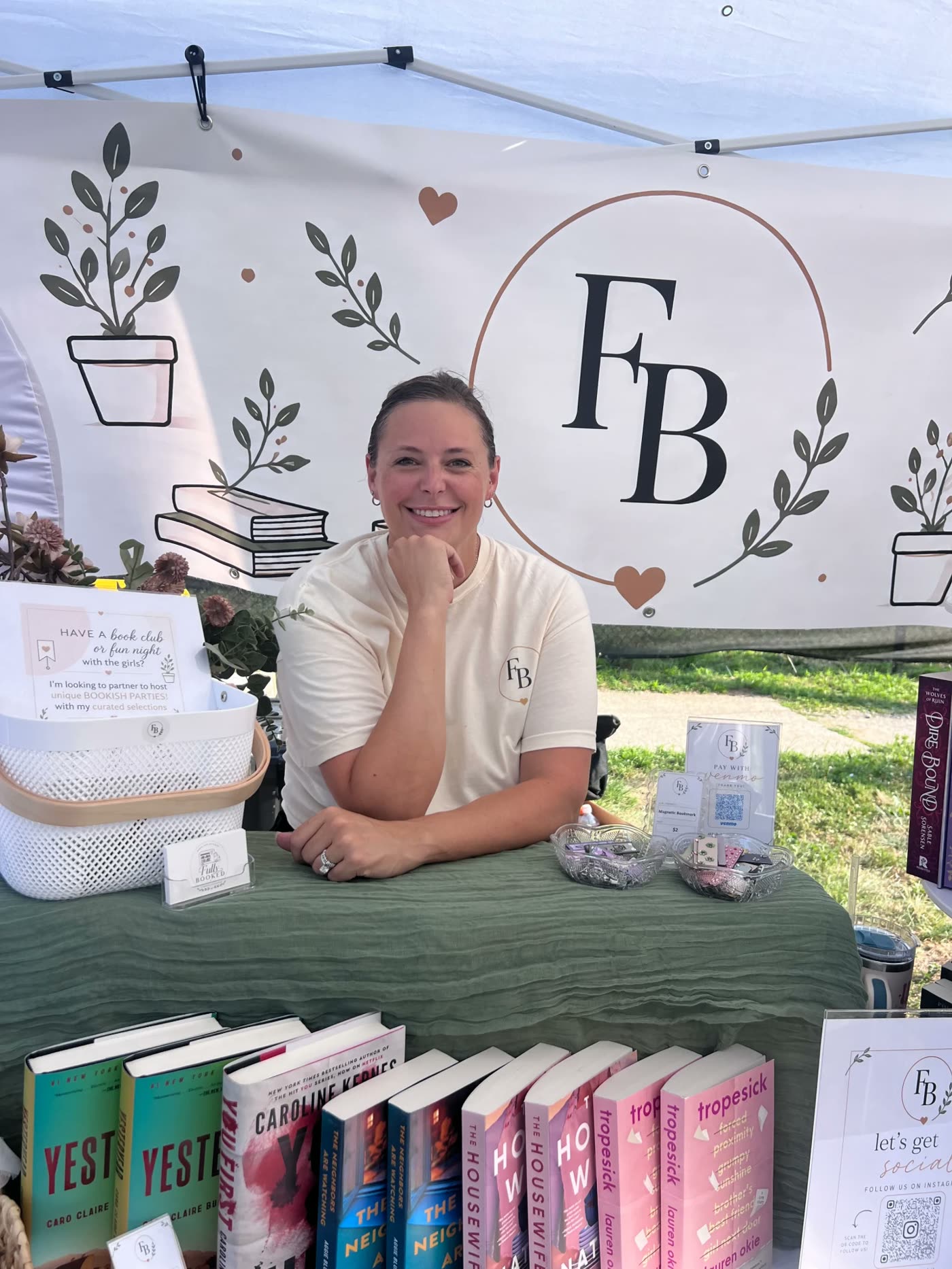 Elisha Carlton, owner of Fully Booked, at her market booth