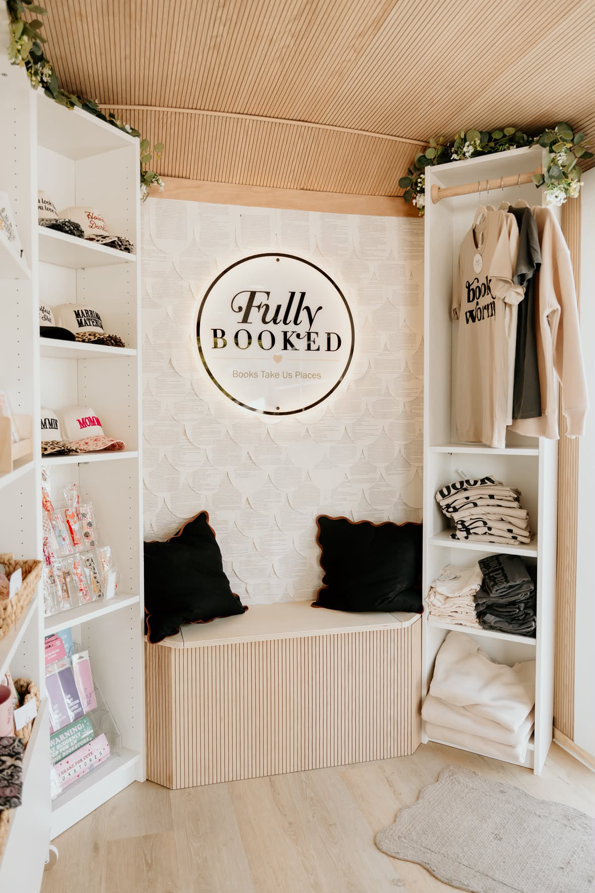 Fully Booked mobile bookstore booth at a Northeast Ohio market with books and bookish accessories